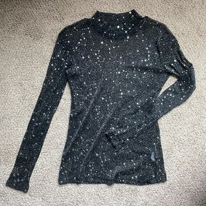 Sheer black with silver star accents mock turtleneck top